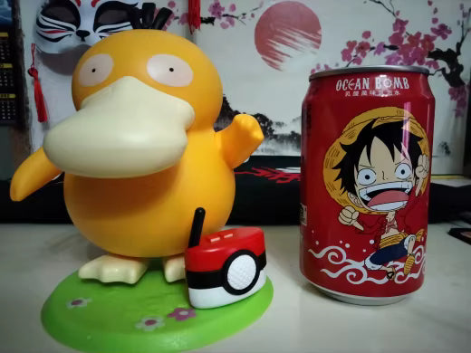 Dim Gray Figura Pokémon Psyduck Bailando en Columpio con Música | Coleccionable Costa Rica