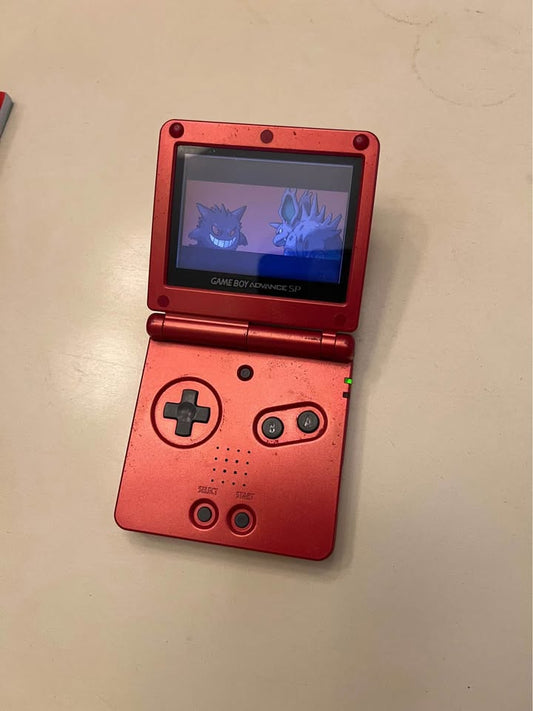 Tan Pokémon FireRed Collector’s Bundle – GBA SP + Guías + Póster + Nintendo Power | Retro Coleccionista Costa Rica