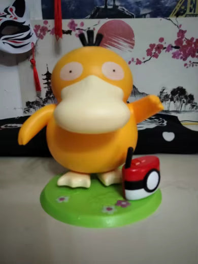 Dim Gray Figura Pokémon Psyduck Bailando en Columpio con Música | Coleccionable Costa Rica